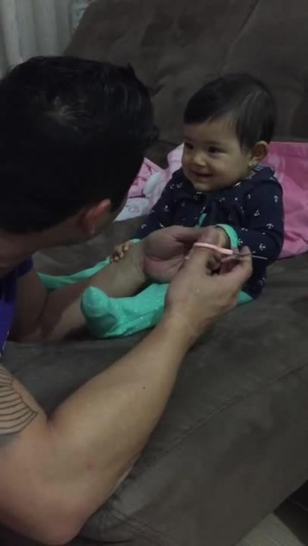 Baby Tries To Scare Dad When Cutting Her Nails Jukin Media Inc