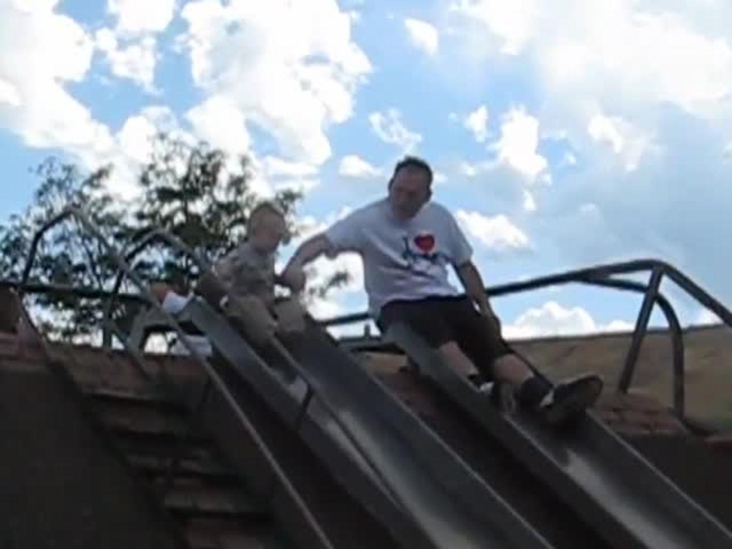 Dad Saves Kid from Falling off Slide Jukin Media Inc