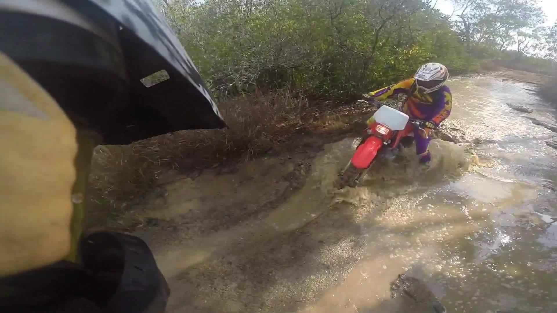 Guy Crossing River on Dirt Bike Falls Off Jukin Media Inc