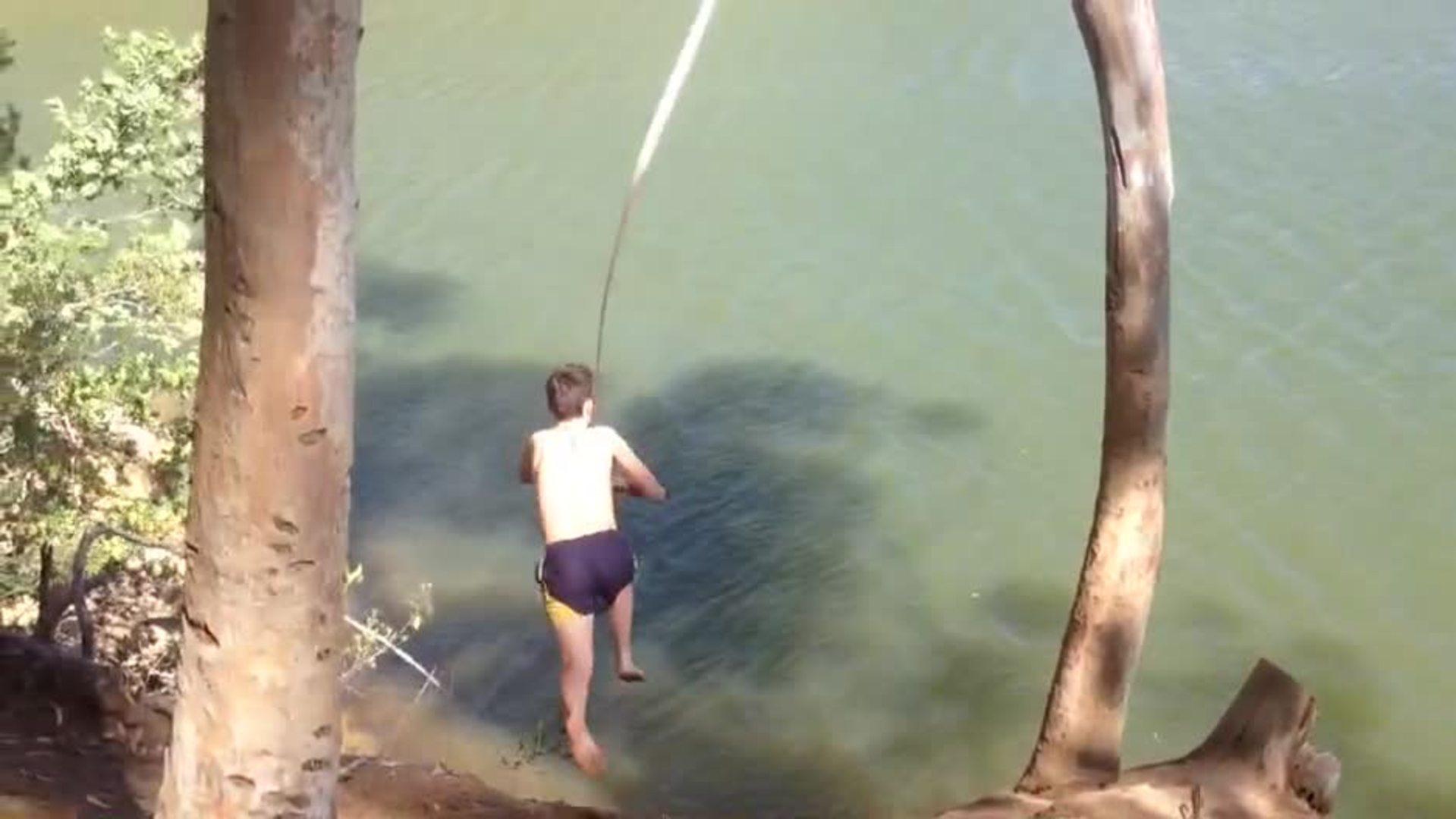 Kid Falls Swinging on Rope Swing Jukin Media Inc
