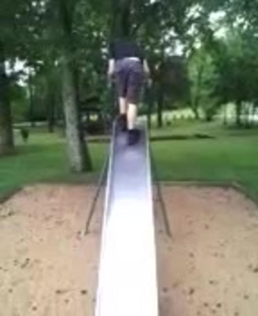 Kid Goes down Slide Backwards and Faceplants Jukin Media Inc