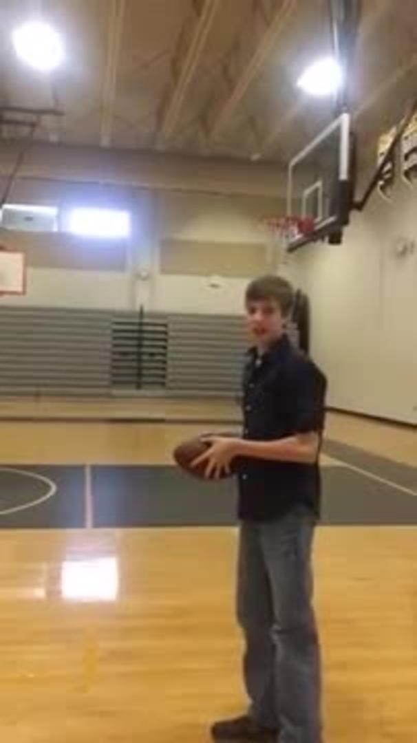 Kid Throws Football into Basketball Hoop from Far Away Jukin Licensing