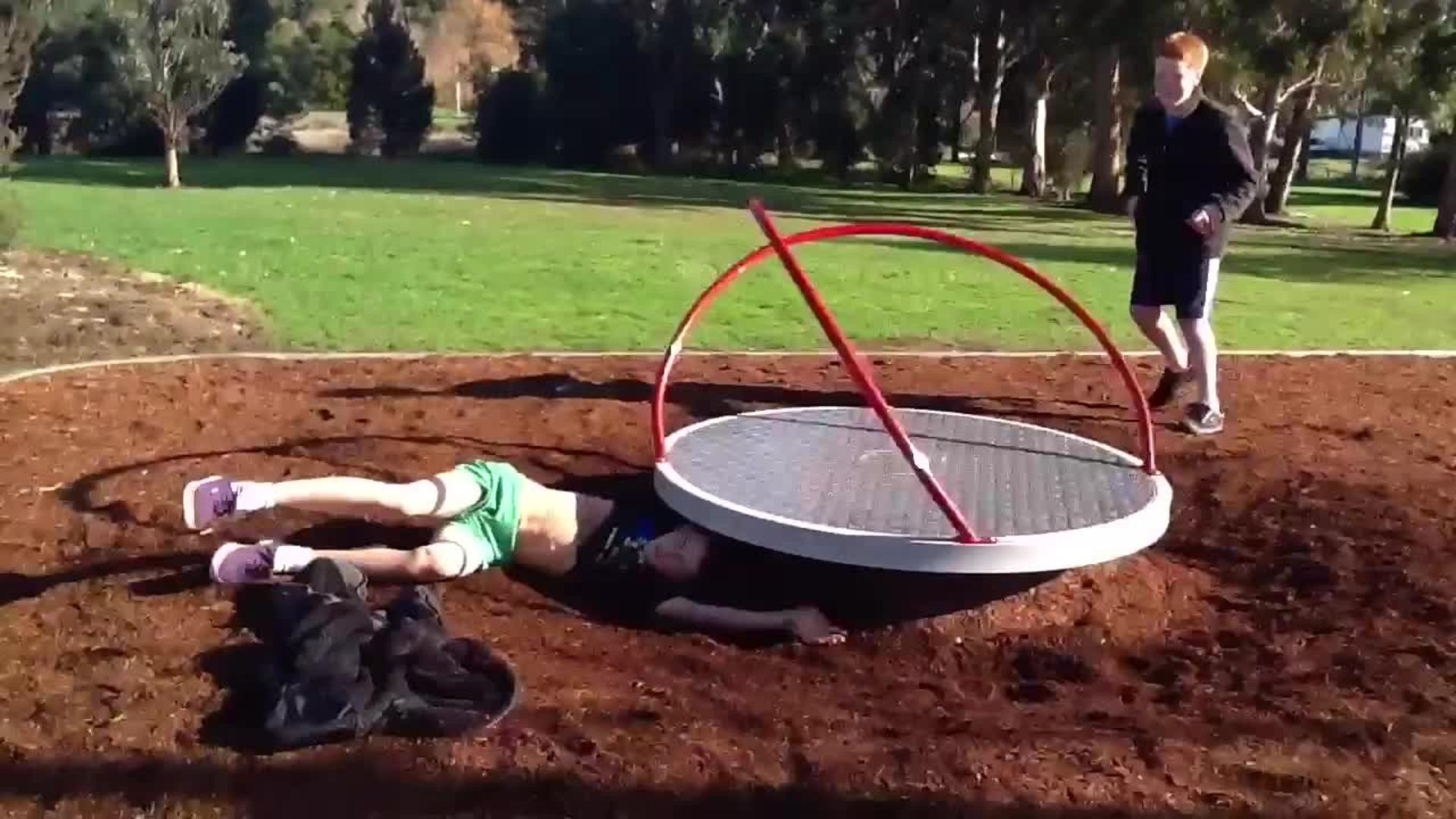 Kid Falls off Playground Spinning Disc Jukin Media Inc