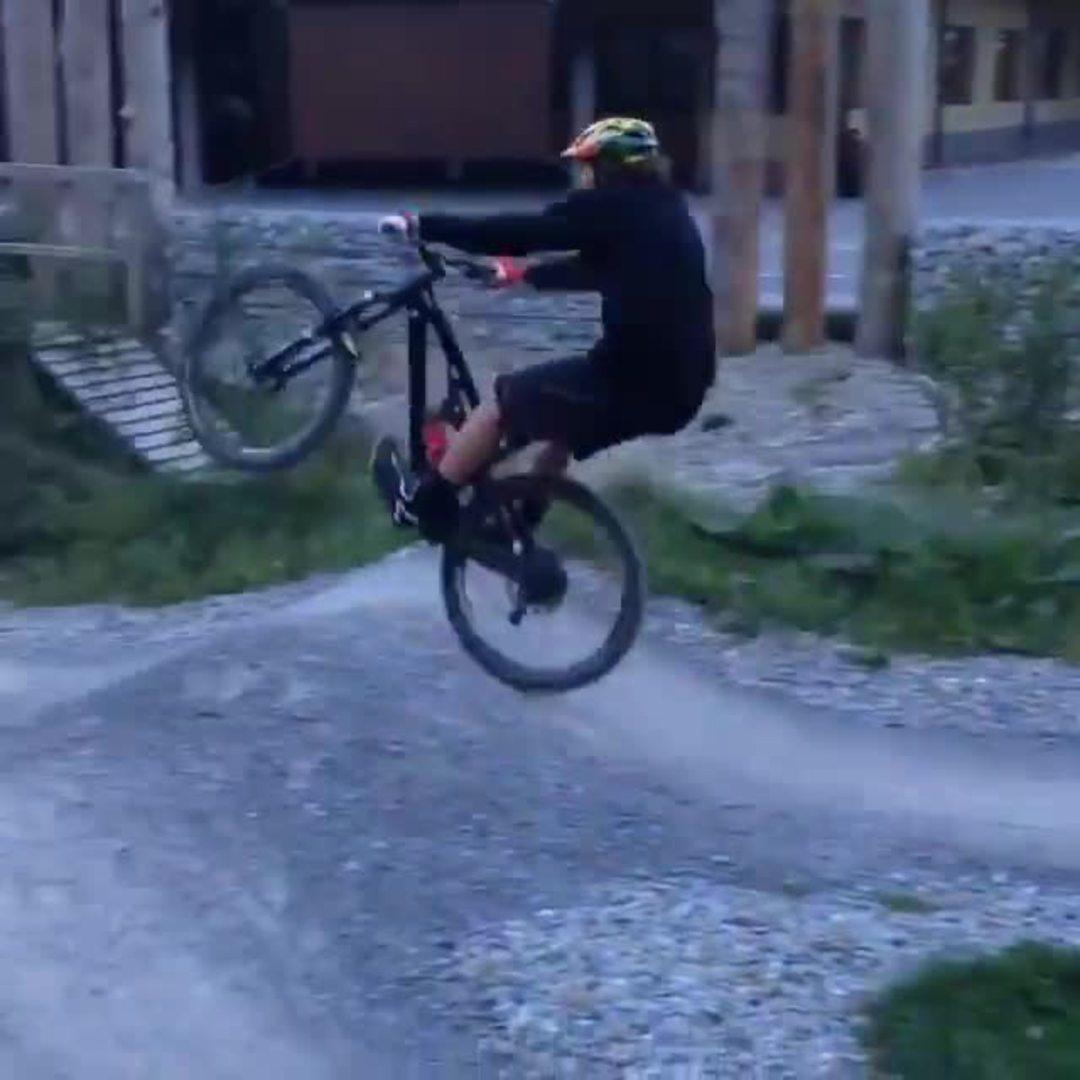 Popping Wheelies in the Courtyard Jukin Media Inc