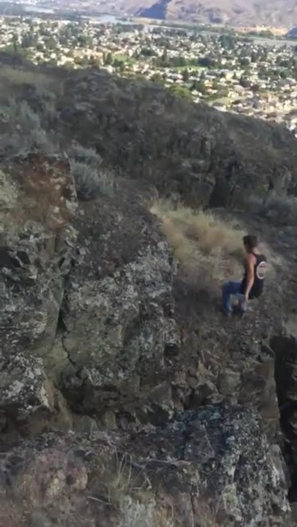 Woman Jumps Off a Cliff in a Dress Jukin Media Inc