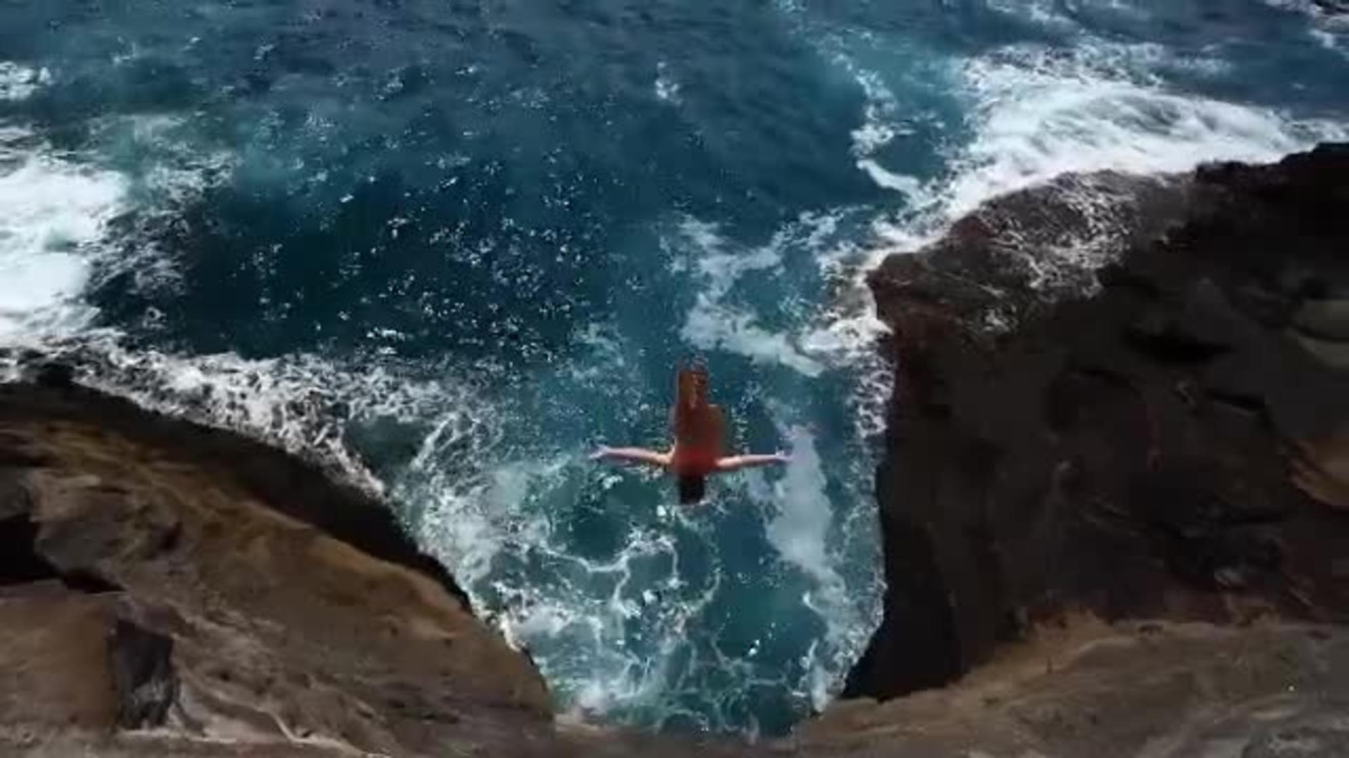 Rock Breaks off Cliff after Guy Jumps off It Jukin Media Inc