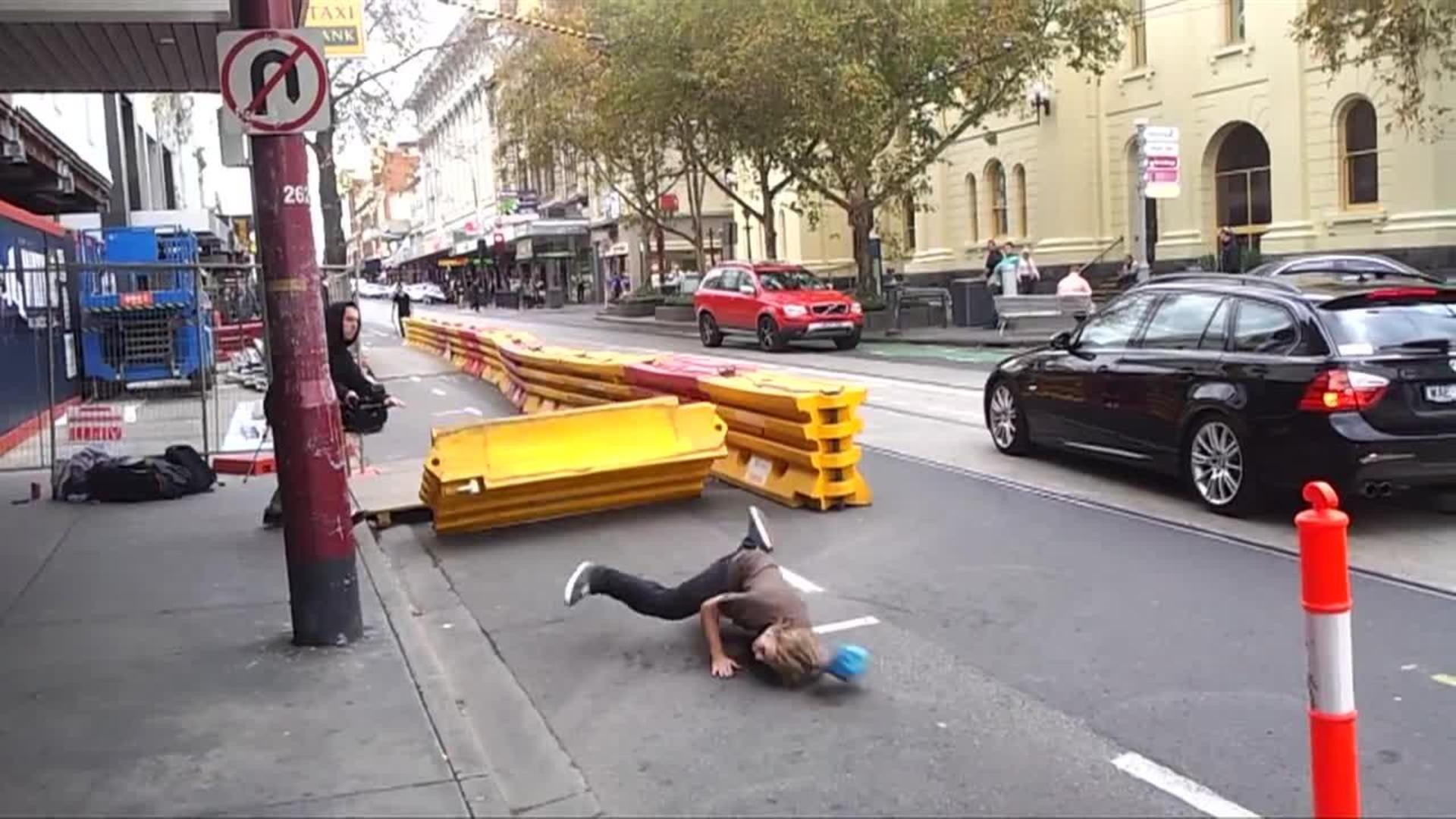 Skater Jumps Over Yellow Roadblock Jukin Licensing