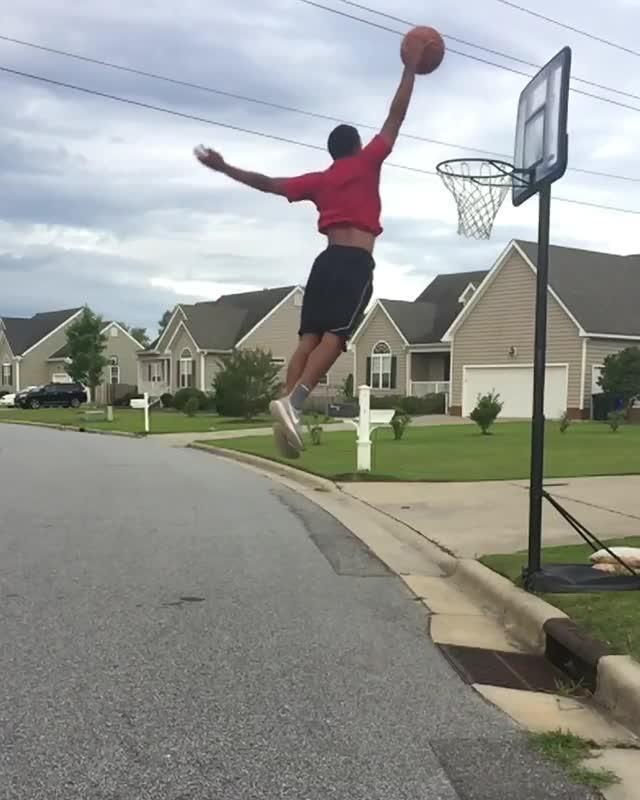 Man Does Dunks on Outside Court Jukin Media Inc