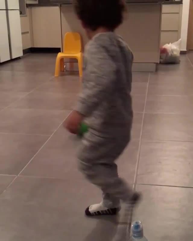 Kid Kicks Ball into Bucket Jukin Media Inc