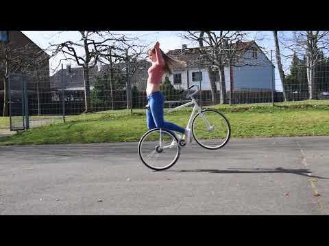 standing on a bike