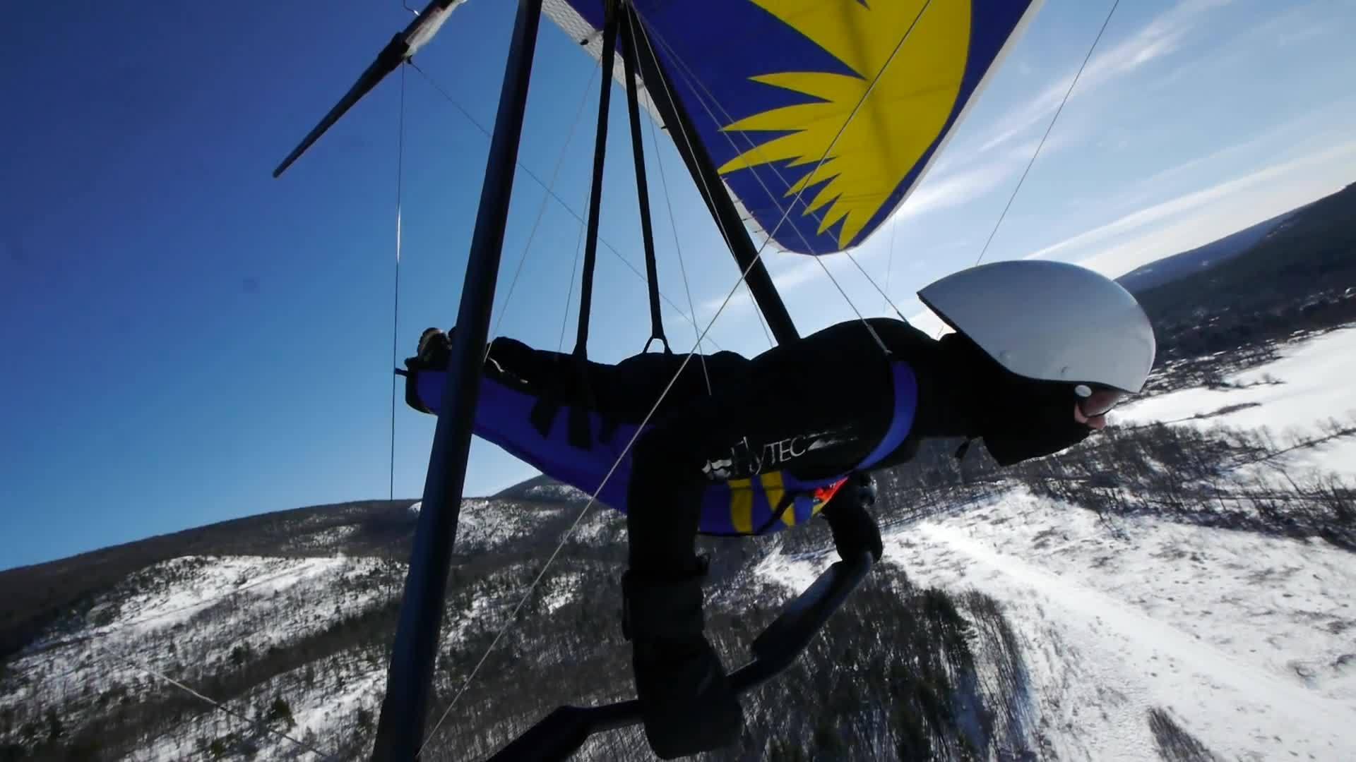 Hang Gliding Over Snowy Mountain Jukin Licensing