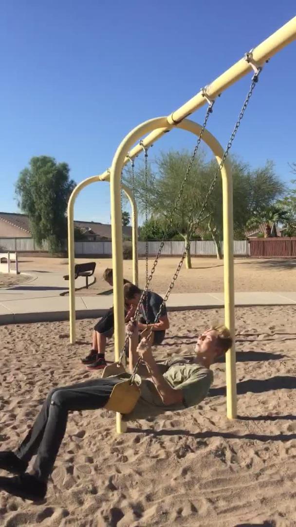 Girl Falls Off Swing While Blowing Kiss to Camera Jukin Media Inc