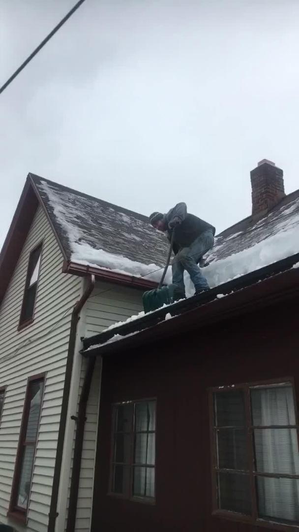 Guy Falls off Roof Trying to Shovel off Snow Jukin Media Inc
