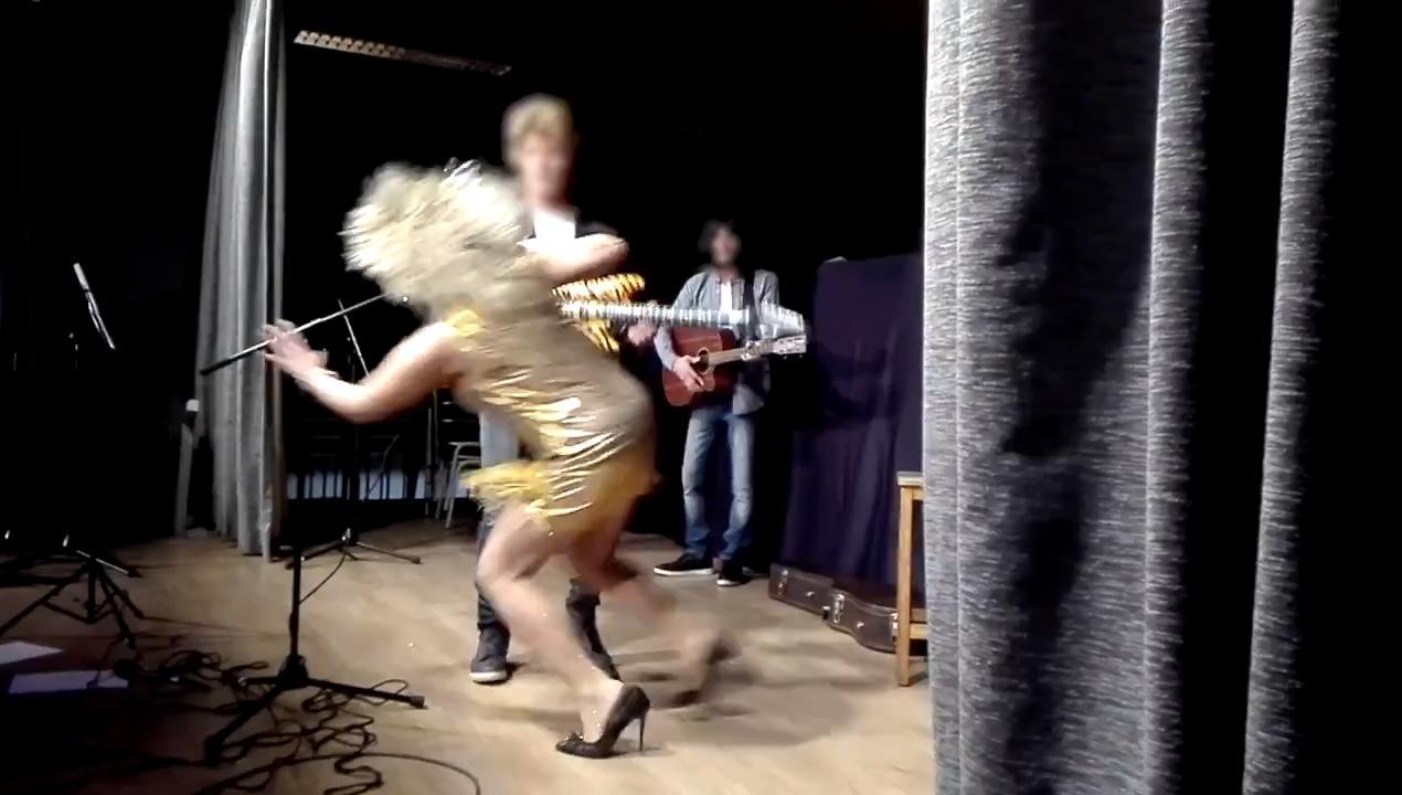 Woman Dancing in Heels Falls Over on Stage Jukin Licensing