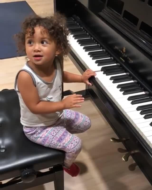 Little Girl Falls off Chair While Playing Piano Jukin Licensing