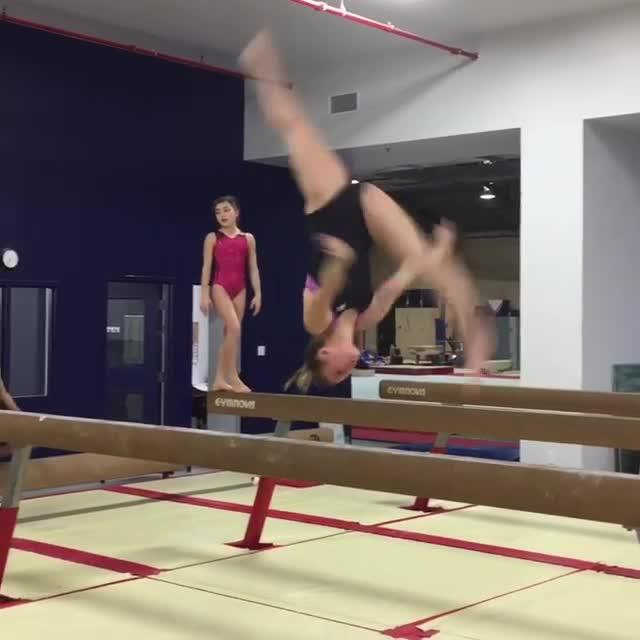 Gymnastics Girl Slips and Falls off Balance Beam Jukin Media Inc