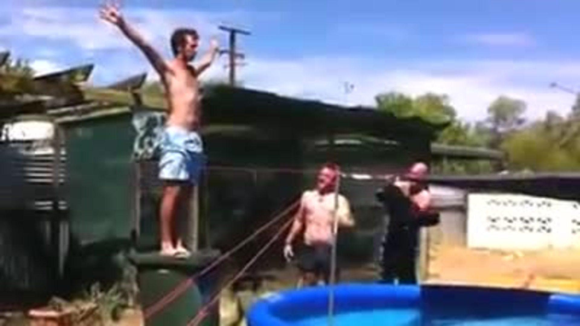Guy Fails Jumping off Trash Can into Pool Jukin Media Inc