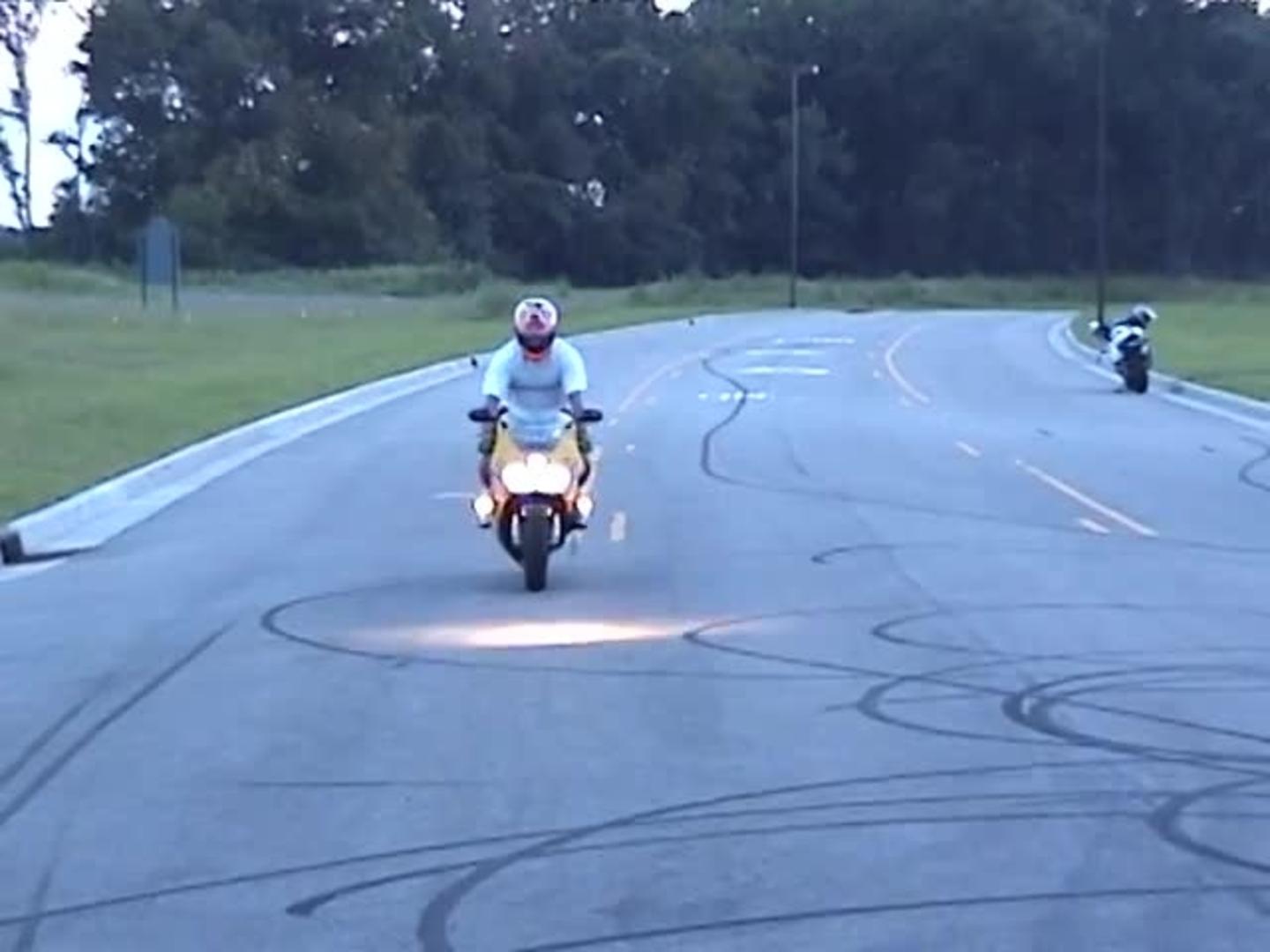 Motorcycle Rider Falls during Stoppie Stunt Jukin Media Inc