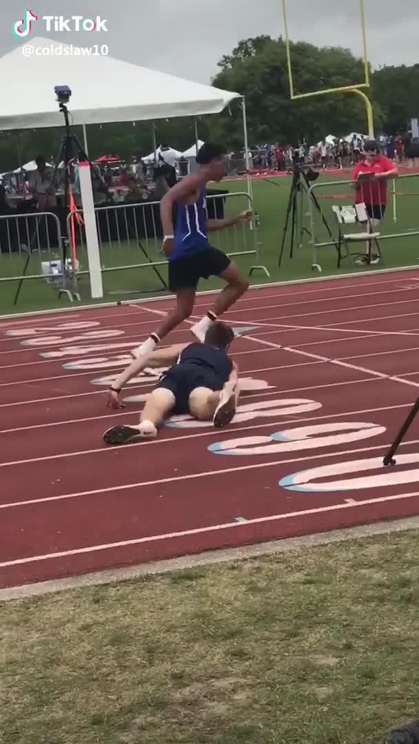 Girl Trips Over Hurdle and Falls During Race Jukin Media Inc