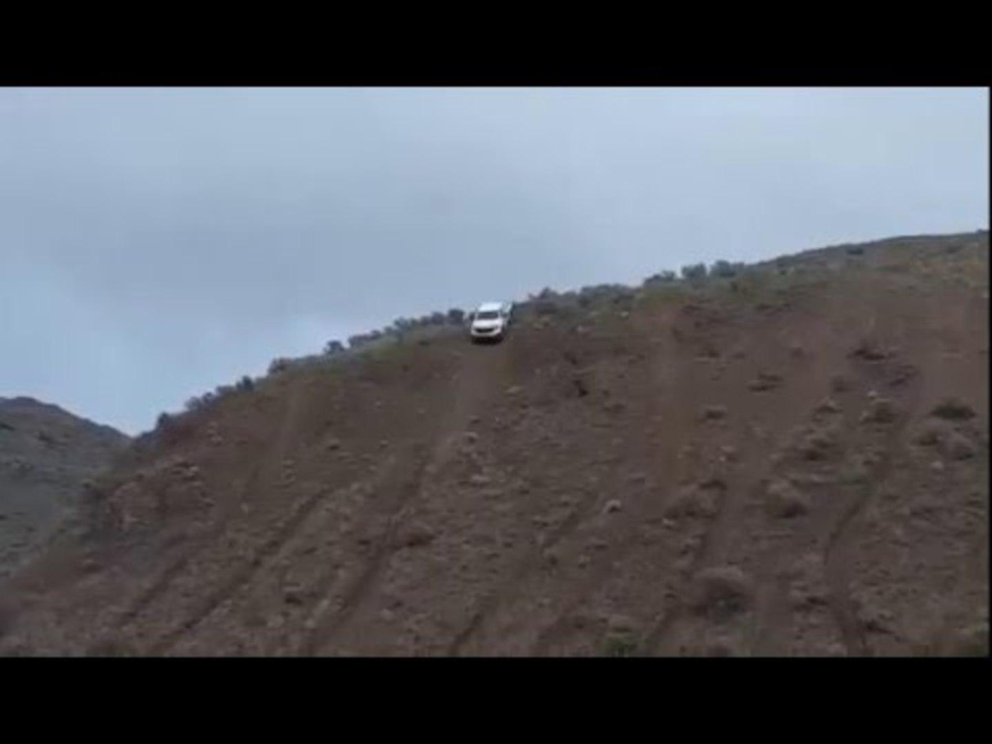 Man Rolls Tire Down Side of Cliff Jukin Media Inc