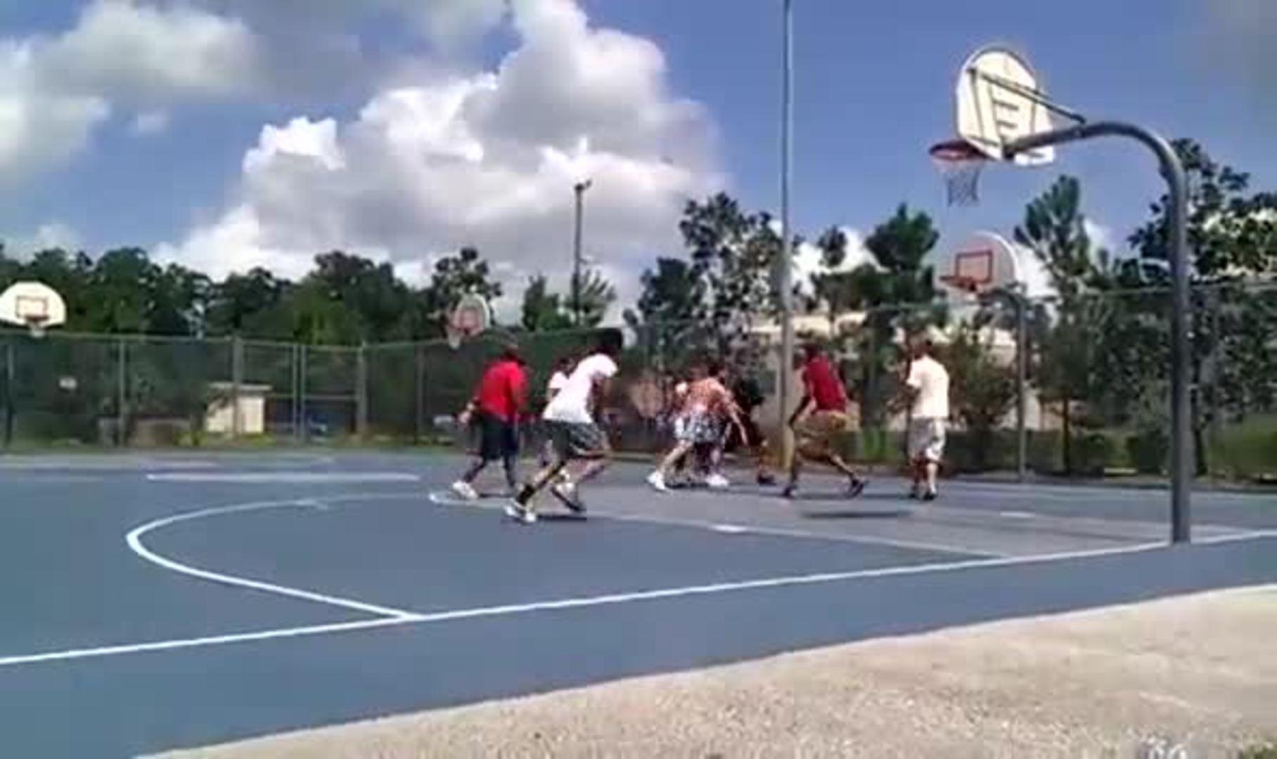 Basketball Players Collide and Fall on Court Jukin Media Inc