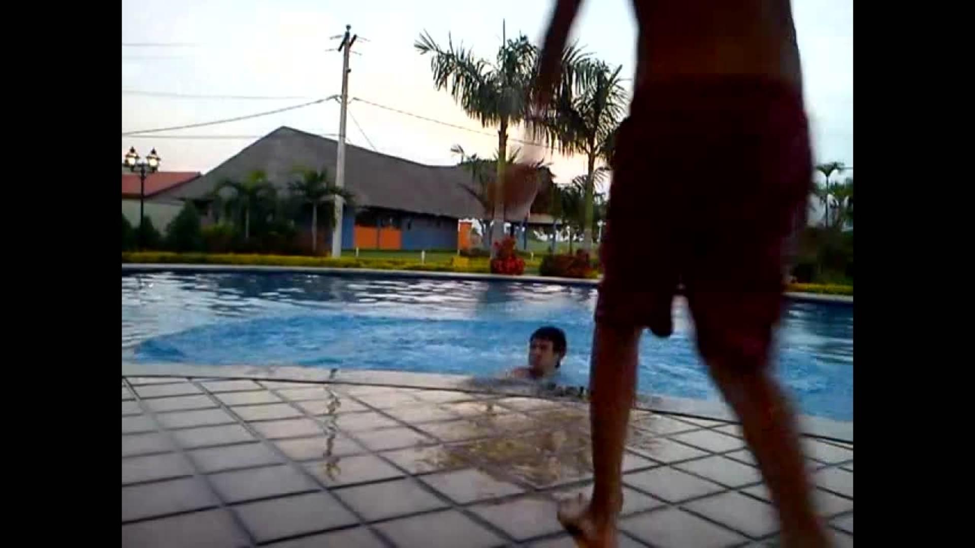 Kid Jumps on Dad's Head in Swimming Pool Jukin Media Inc
