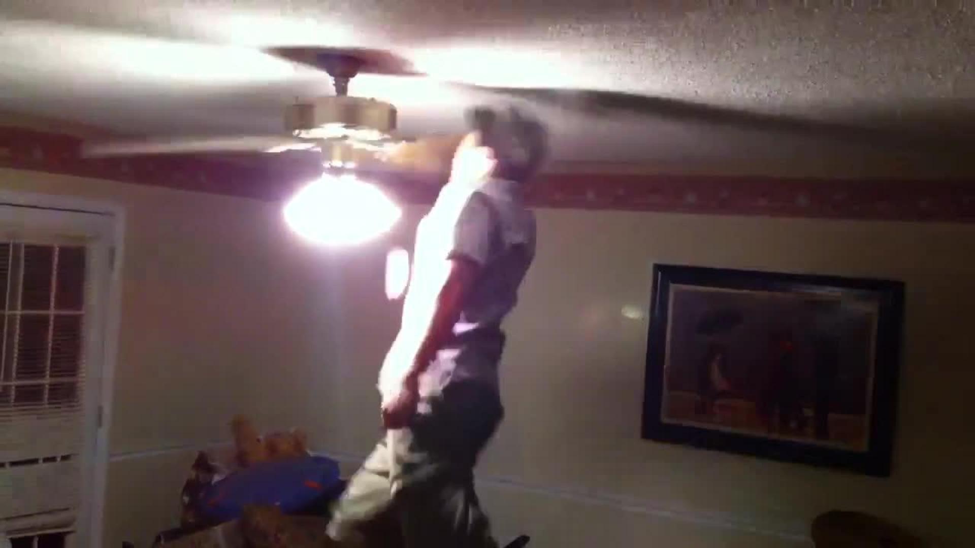 Guy Bumps the Ceiling Fan With his Head And it Falls to the Floor