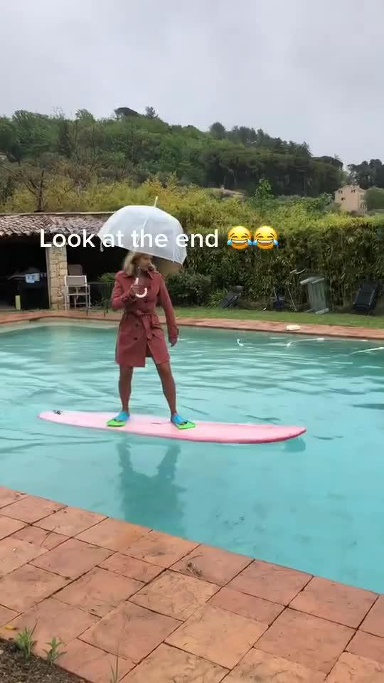 Girl Falls Flat on Face While Jumping Out of WaterFilled Plastic Tote