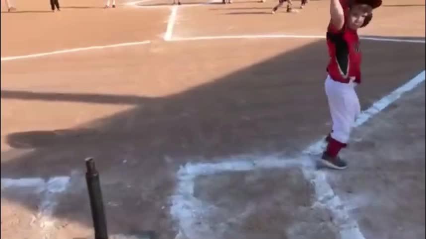 kid-gets-hit-in-the-head-with-bat-while-playing-tee-ball-jukin-media-inc