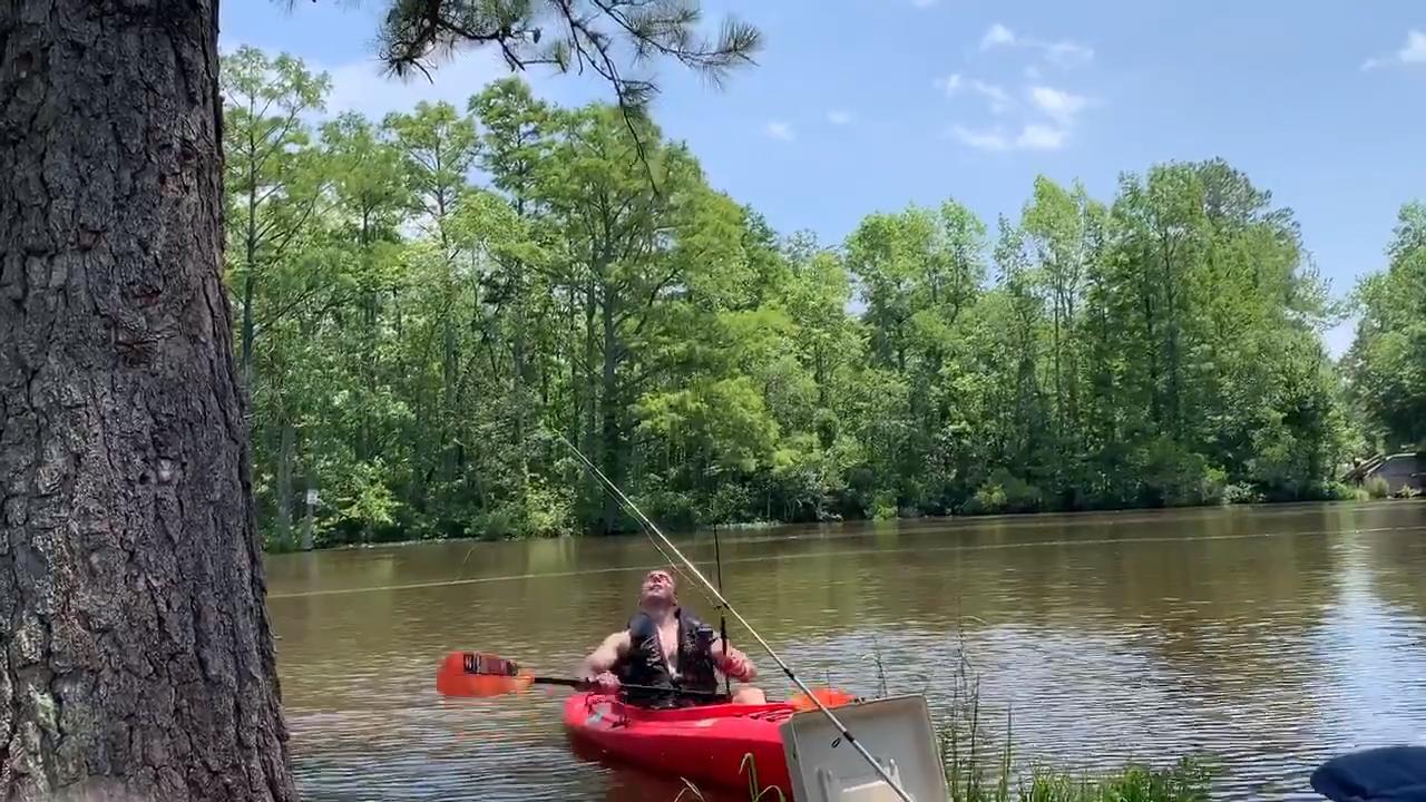 Man Falls Off Kayak While Trying to Detach His Fishing Line From Tree