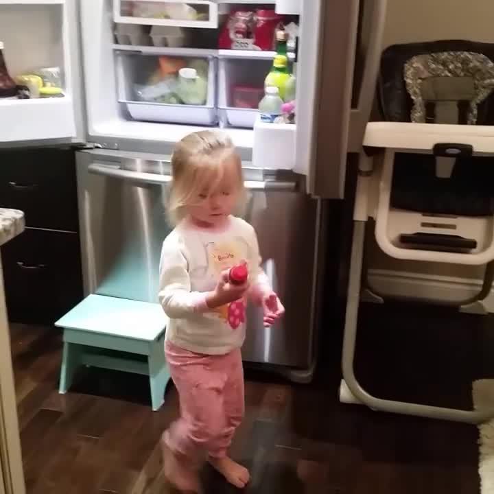 Kid With Climbing Skills Climbs Doors of Refrigerator via its Handles