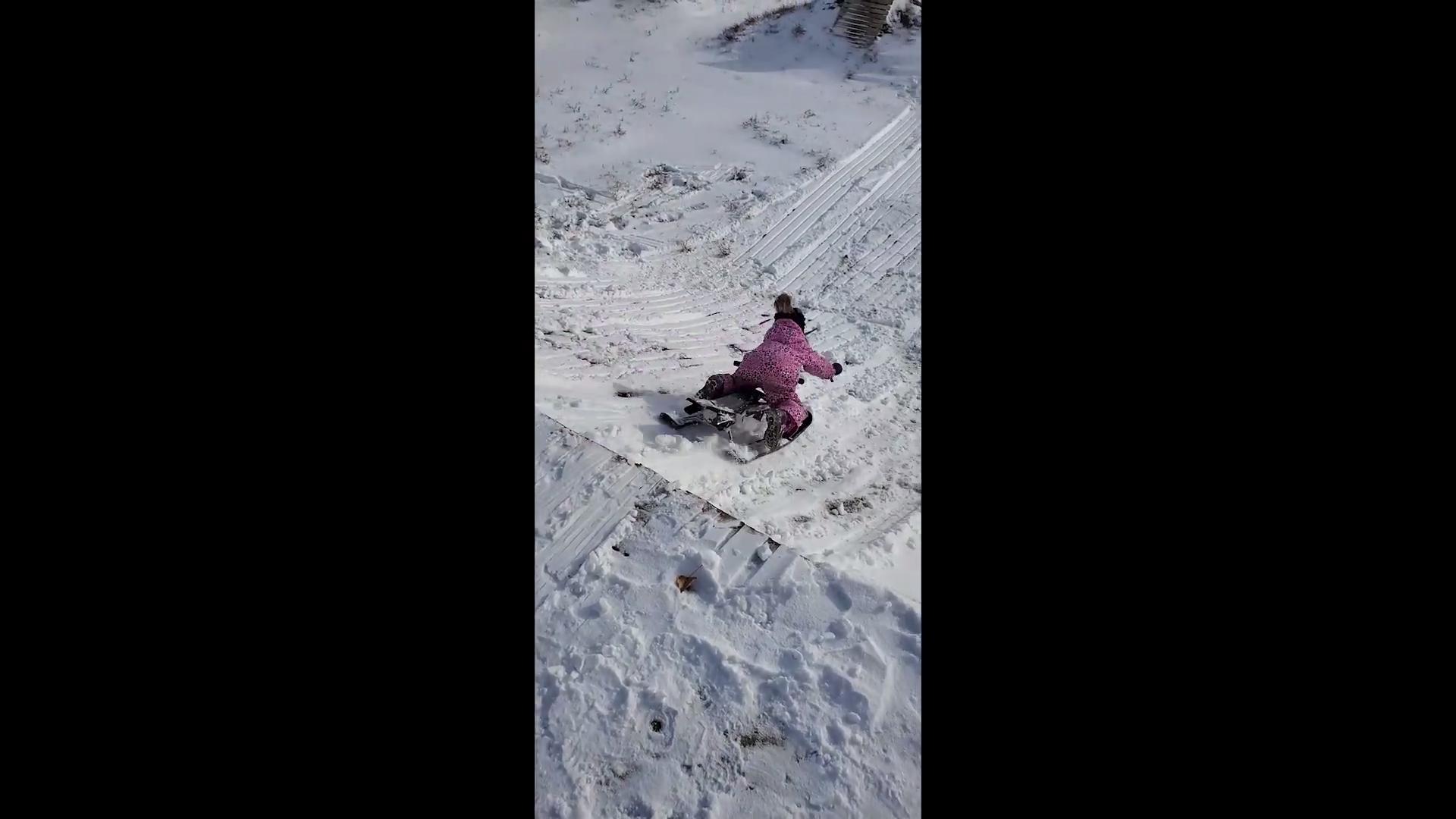 Sledding Kid Falls Off Sled After it Hits Bump Jukin Media Inc