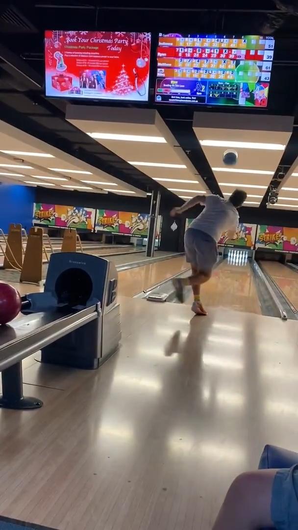 Guy Throws Ball And Misses Bowling Track But Luckily Strikes All Pins On Another One Jukin
