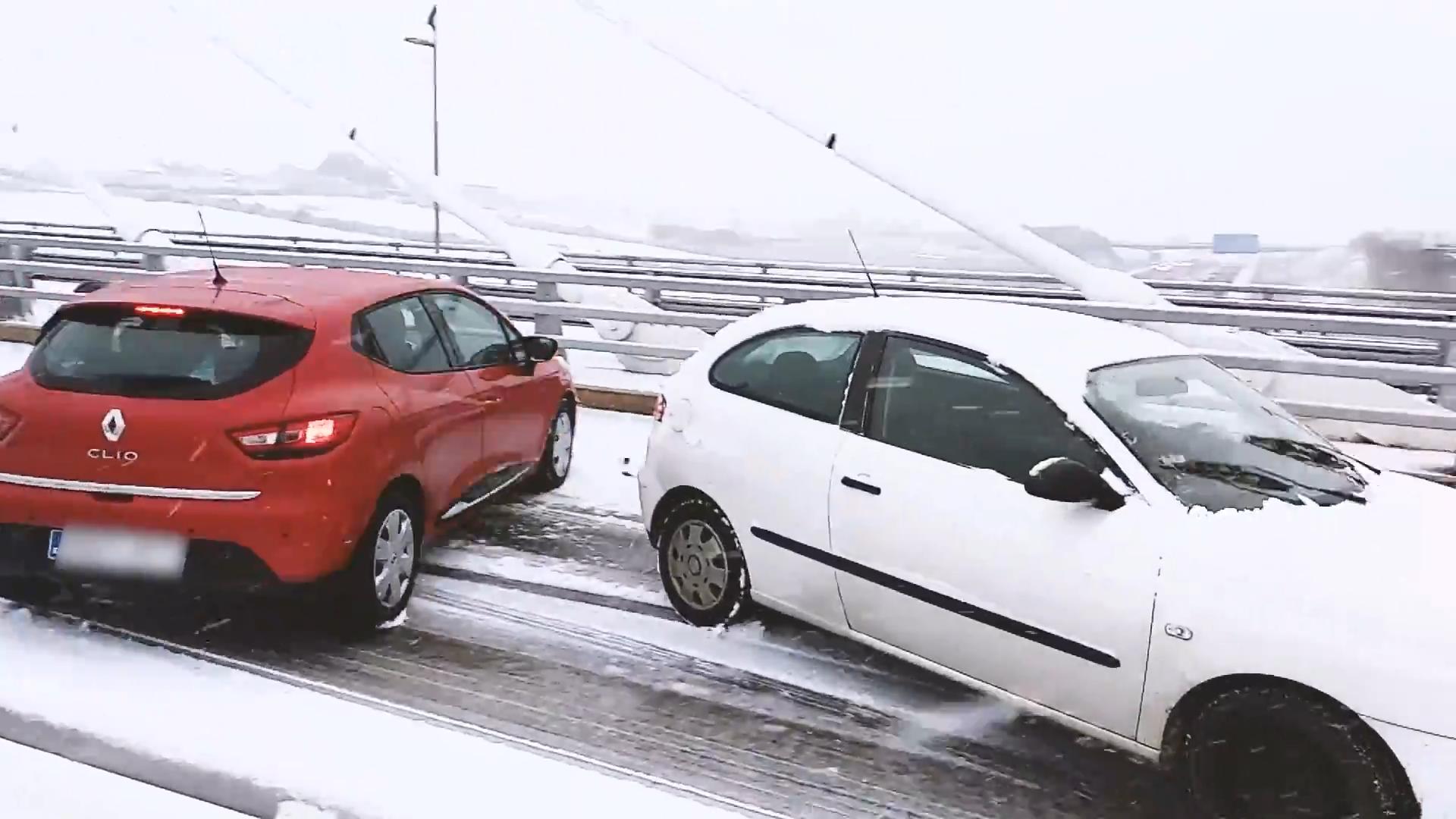 Cars Slide on Snow Covered Road in Spain Jukin Licensing