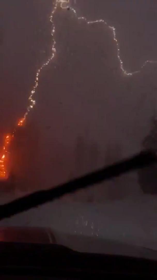 Lightning Strikes Close to Car Jukin Media Inc