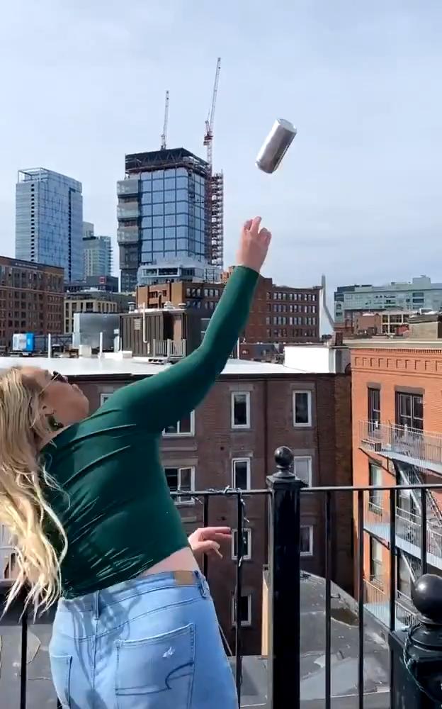 Woman Throws Beer Can At Neighbor's Rooftop For Socially Distanced Celebration Jukin Licensing