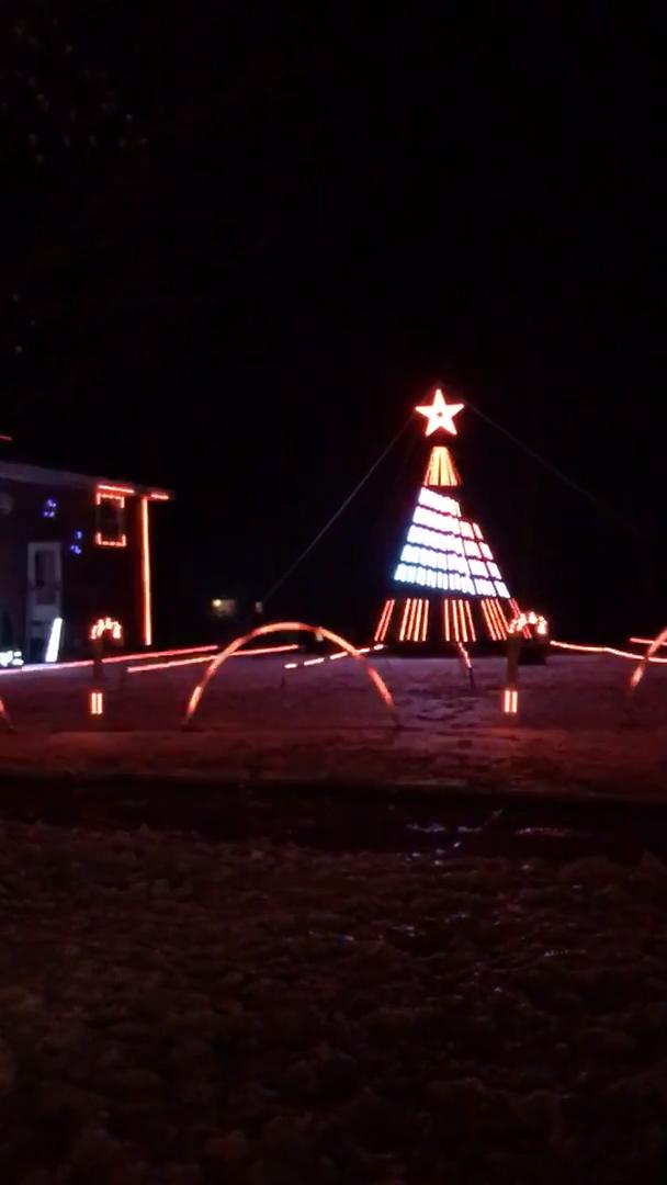 Decorative Christmas Lights Shine in Synchronization With Music Playing