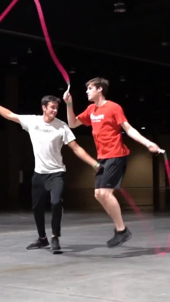Two Guys Jump Rope On Stage In Sychronization | Jukin Licensing
