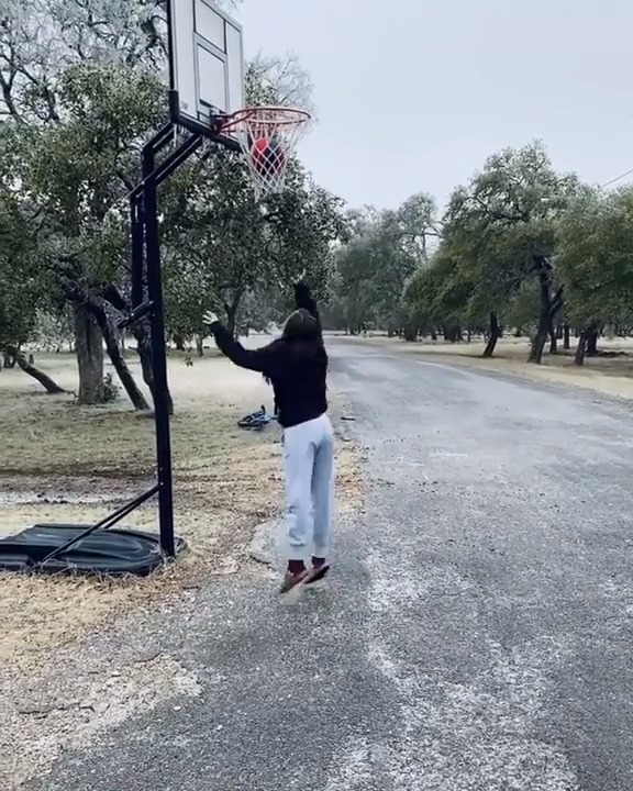 Girl Shoots Basketball Into Hoop Which Gets Stuck in Frozen Net Jukin