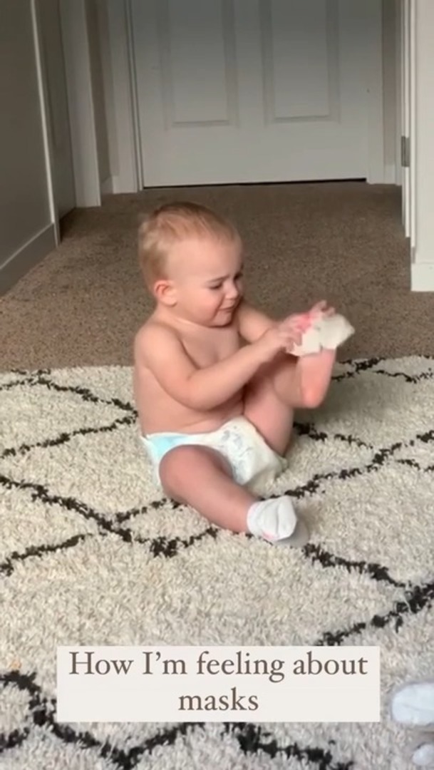 Baby Gets Frustrated And Throws Away Socks While Trying To Wear It