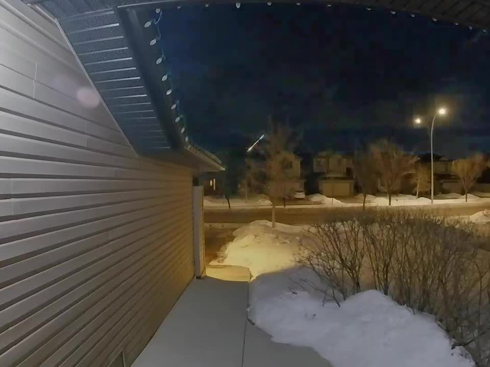 Security Camera Captures a Meteor Flying Downwards In Canada Jukin