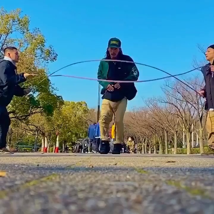 Guy Shows Amazing Dance Moves While Rope Jumping With Two Cables