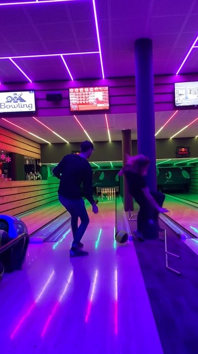 Woman Falls After Guy Accidentally Hits Her Leg With Bowling Ball - A Bowling Ball Accidentally Falls Out Of The Cargo Bay