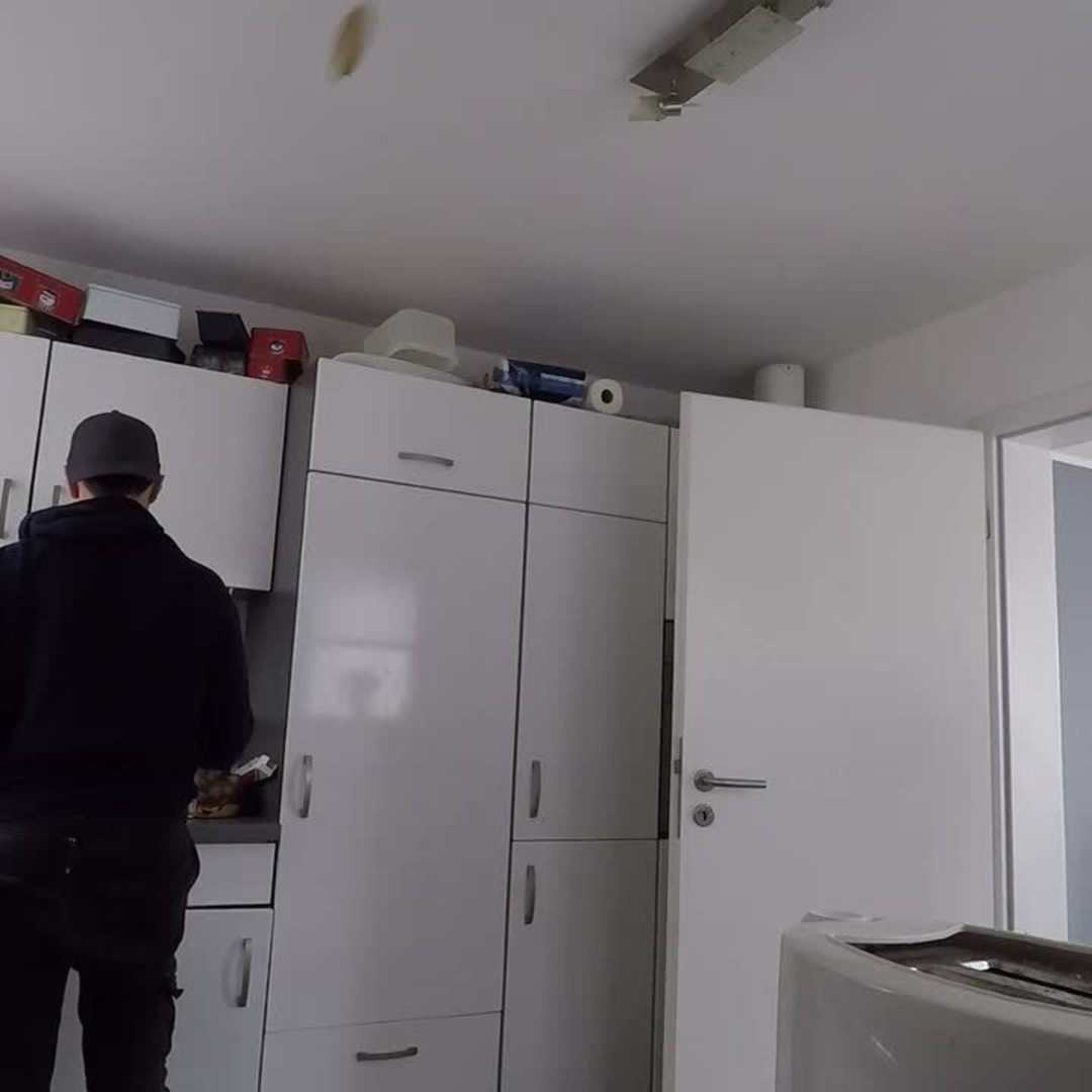 Guy Throws Various Items Into Their Designated Holders While Looking