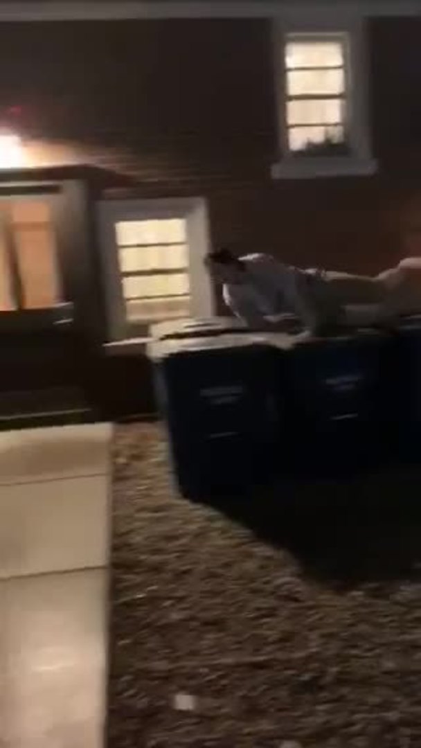 Man Trying to Jump Over Trash Cans Ends up Crashing Down on Them Jukin Licensing