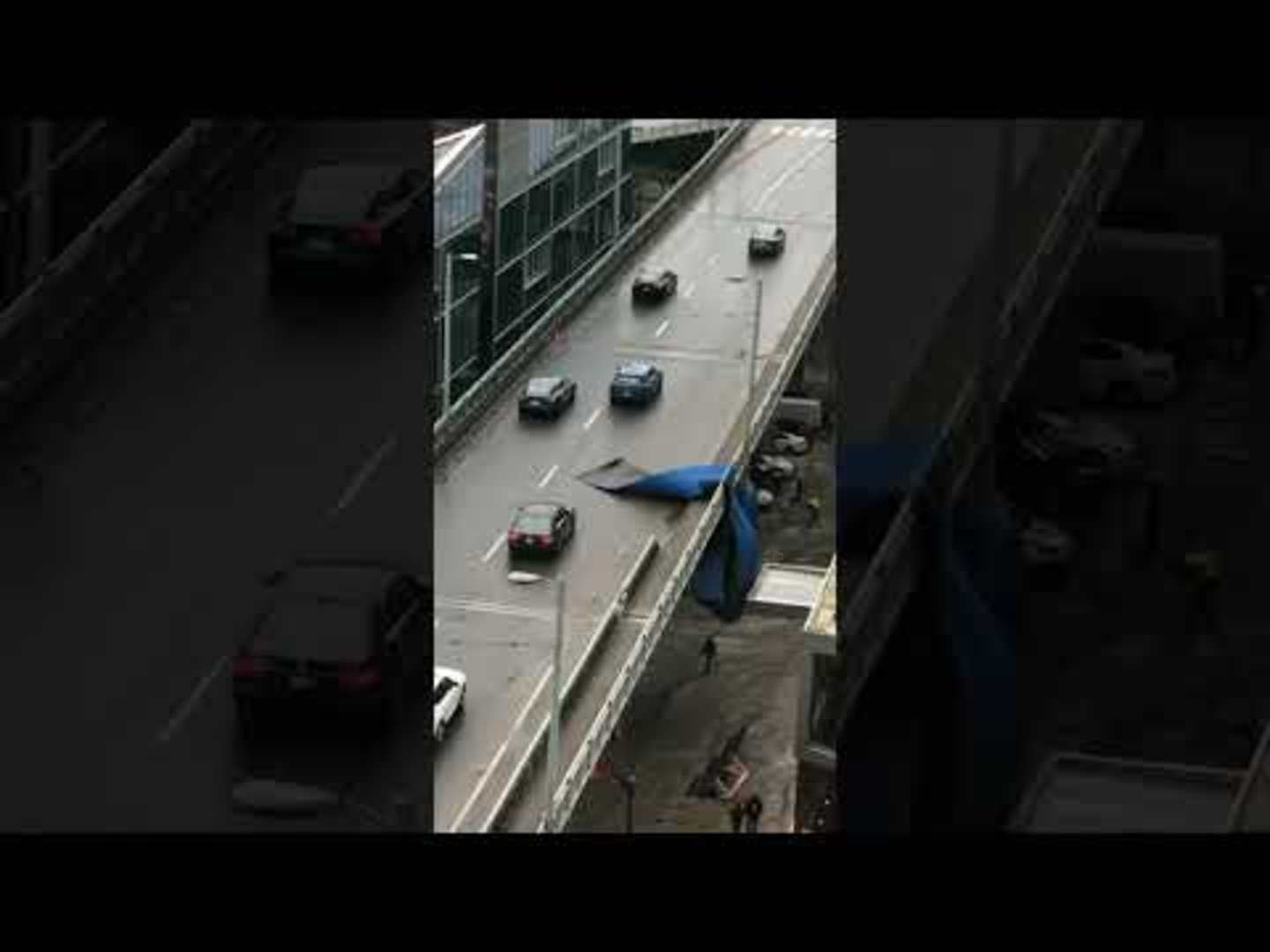 Pool Tarp Flies Away Due to Wind storm and Gets Stuck on Overpass In