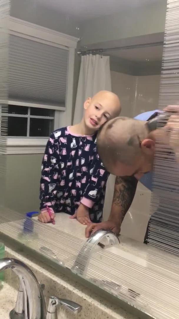 Dad Shaves Head to Support Daughter Jukin Licensing
