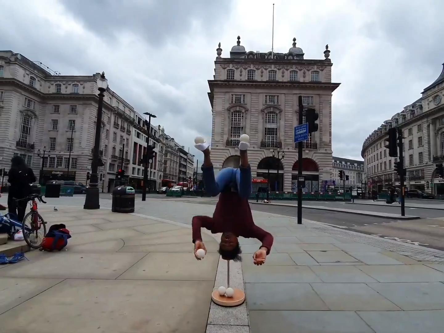 Two Guys Perform Amazing Juggling Tricks While Upside Down Jukin