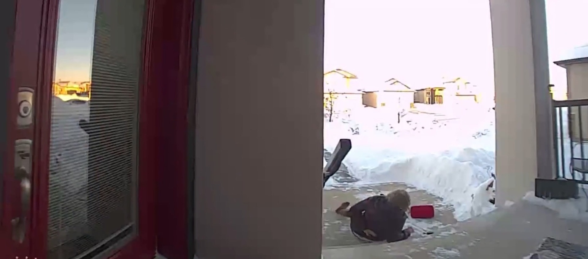Woman Slips on Snow Covered Stairs and Hurts Her Back Jukin Licensing
