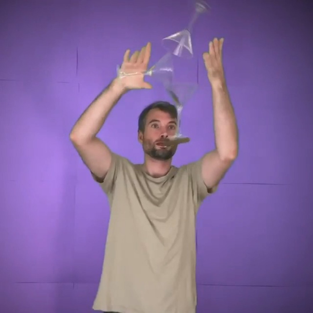Guy Shows Unique Juggling Trick With Martini Glasses And Mouth Stick